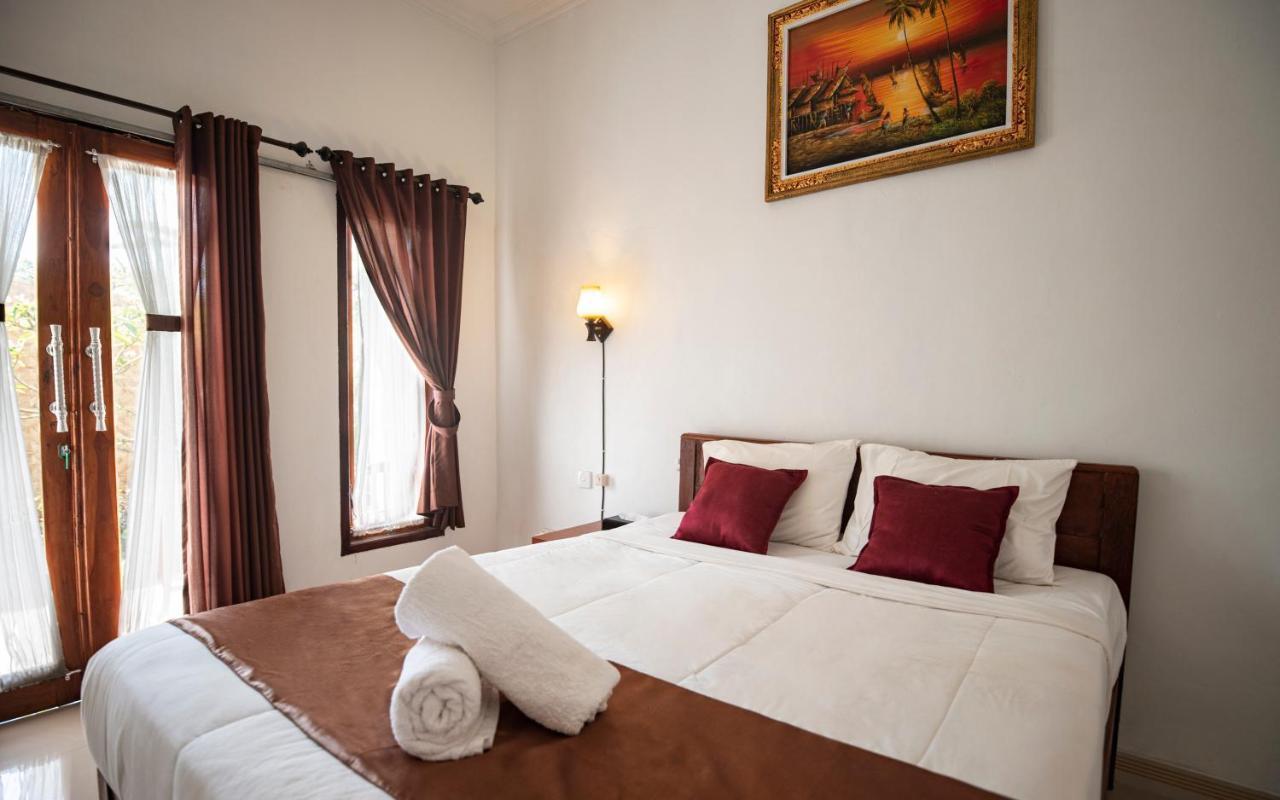Santhi Guna Bungalow Toyapakeh Екстер'єр фото